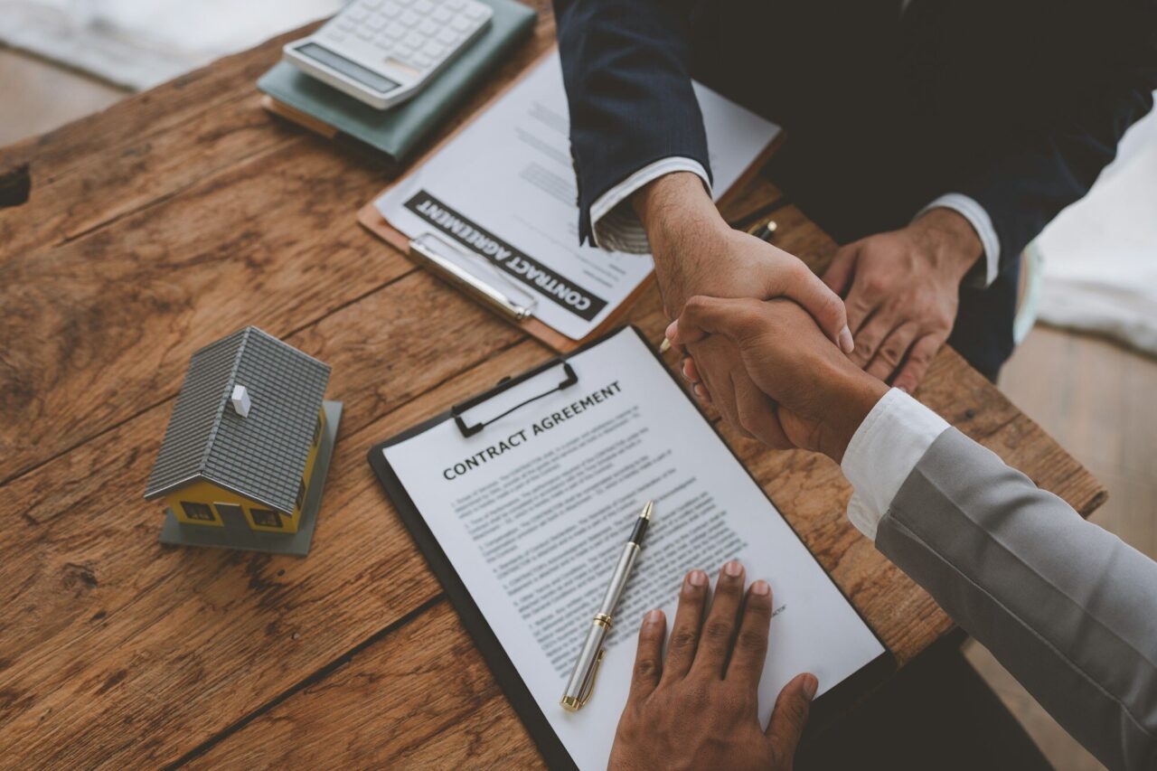 handshake-of-real-estate-brokers-with-customers-or-investors-mortgage-loan-agreements-make-a-lease-